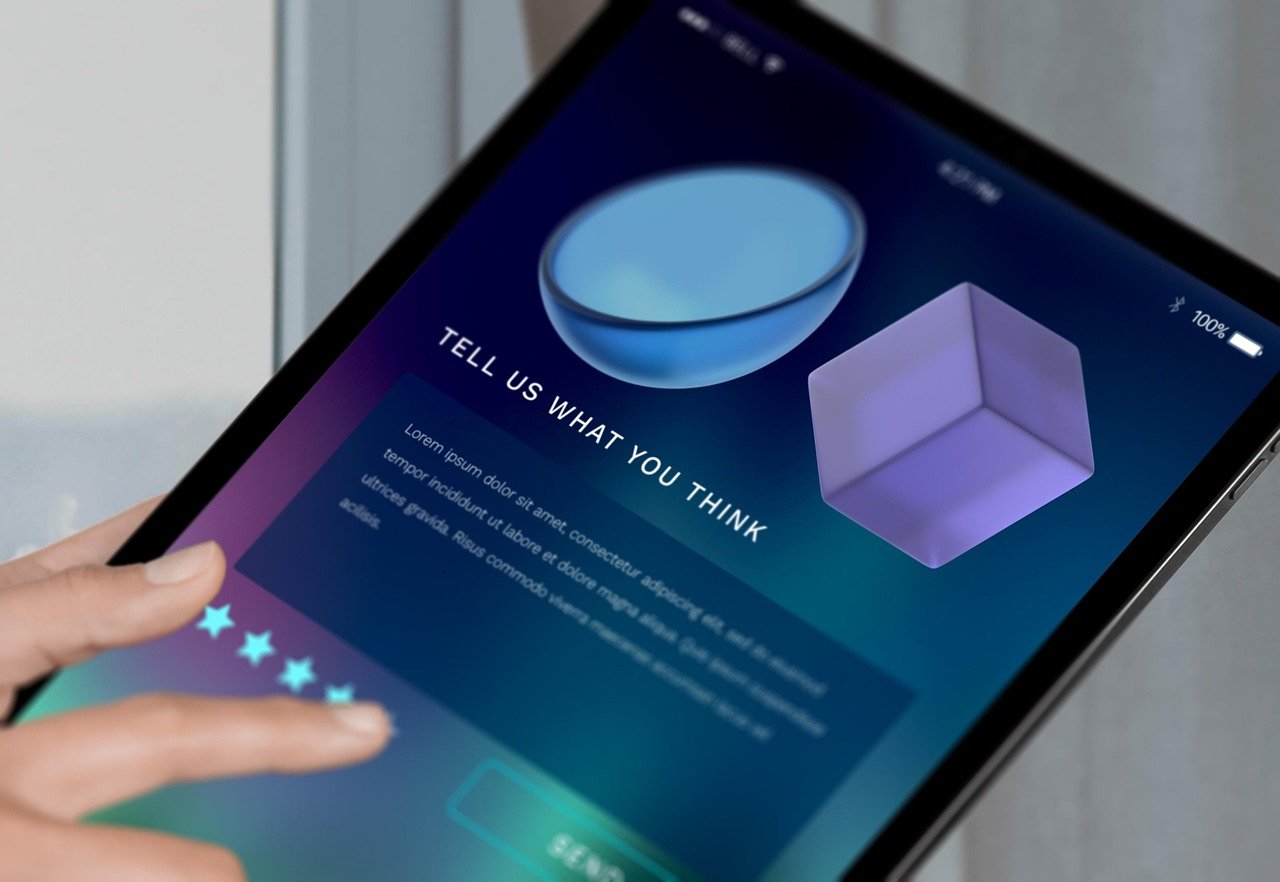 A customer leaving a star rating on a tablet